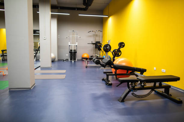 istock Modern gym with exercising machines 1146473390