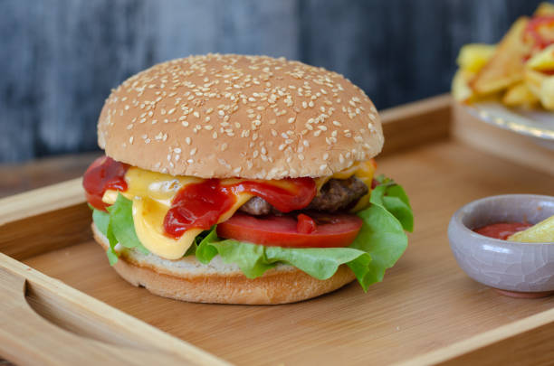 istock Hamburger and potato fries 1146477173