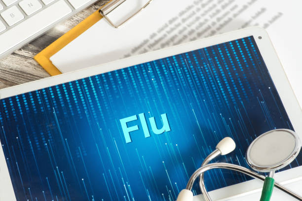 istock A tablet PC, stethoscope and warning of flu 1146478524