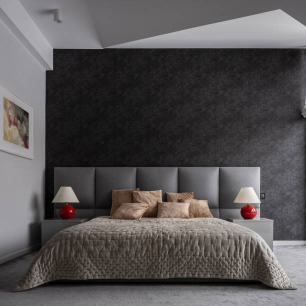istock Bedroom with black wallpaper 1146479769