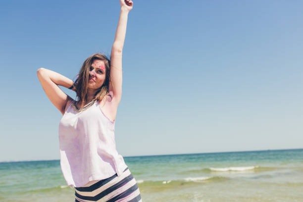istock Young woman on the beach 1146480132