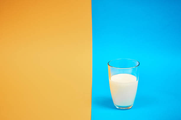 istock glass of milk on a colored background 1146481471
