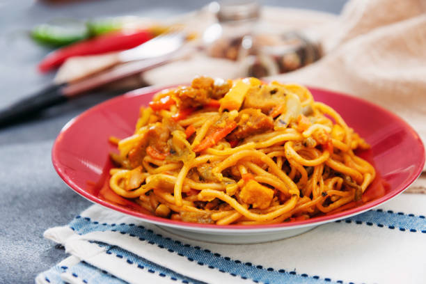 istock Vegetable noodles with chicken meat preparation 1146482250