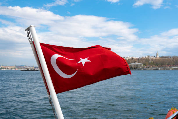 istock Turkish flag waving at sea and sky 1146482382