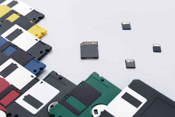 istock The evolution of digital data storage device. Floppy disks and memory cards isolated on a white background. 1146482919