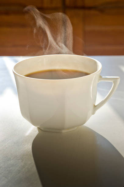 istock cup of steaming coffee on the kitchen table 1146484029
