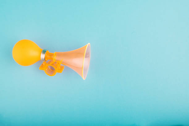 istock plastic and rubber material bike horn for warning or announce object over blue background.copy space for text 1146484782