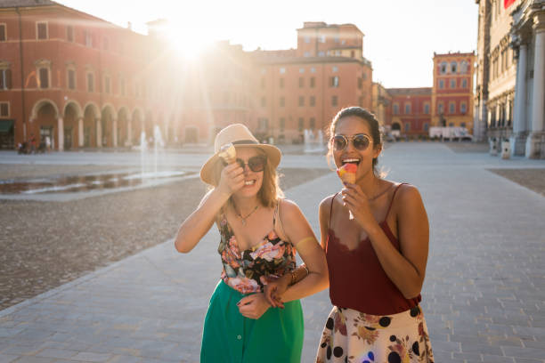 istock friends having fun on a nice sunny day in the city 1146487996