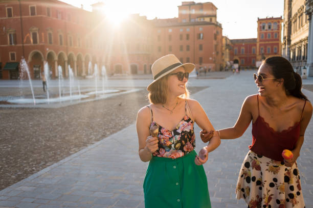 istock friends having fun on a nice sunny day in the city 1146488087
