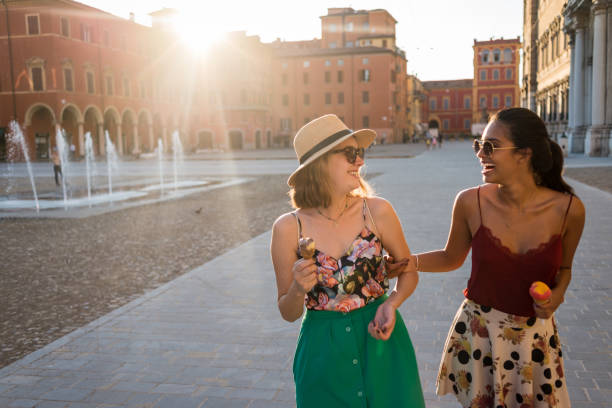 istock friends having fun on a nice sunny day in the city 1146488105