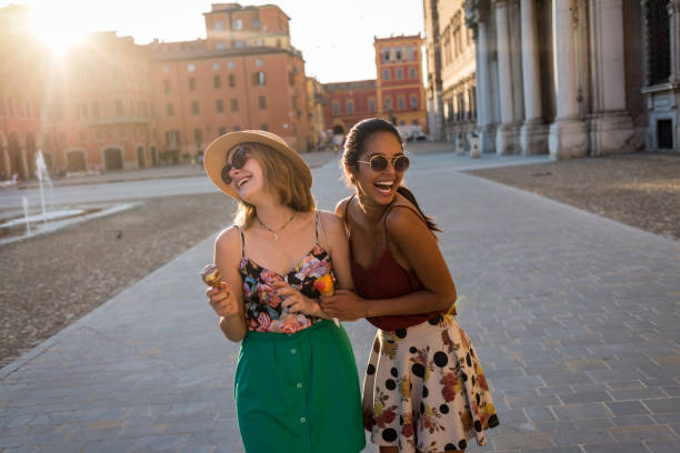istock friends having fun on a nice sunny day in the city 1146488237