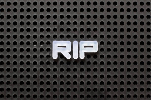 istock Black color pegboard with white letter in word RIP (abbreviation of rest in peace) 1146488240