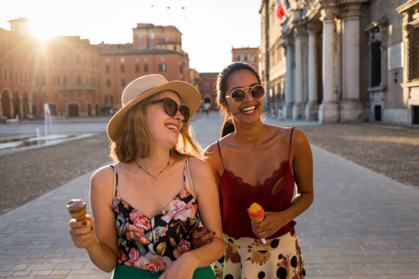 istock friends having fun on a nice sunny day in the city 1146488613