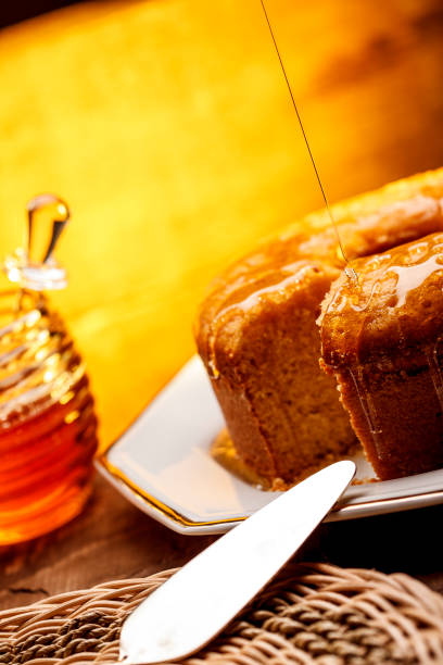 istock Honey cake on wooden background 1146488980