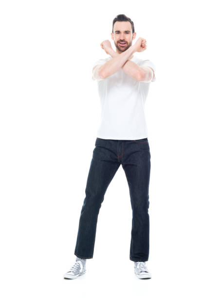 istock Handsome man in white shirt and jeans 1146490139