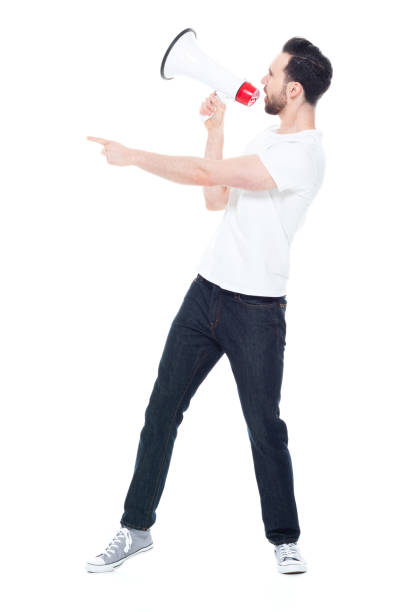 istock Handsome man in white shirt and jeans 1146492144