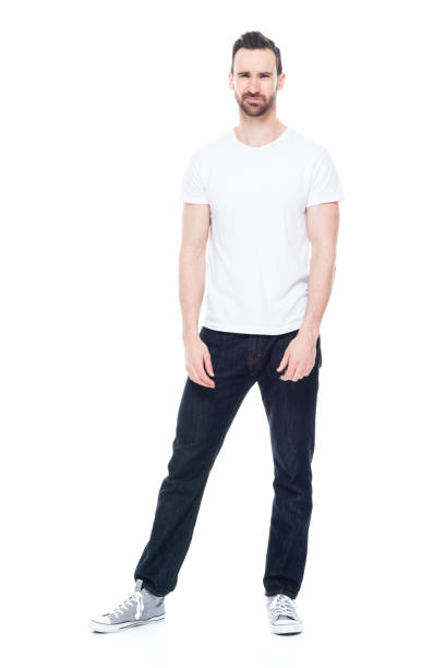 istock Handsome man in white shirt and jeans 1146492146