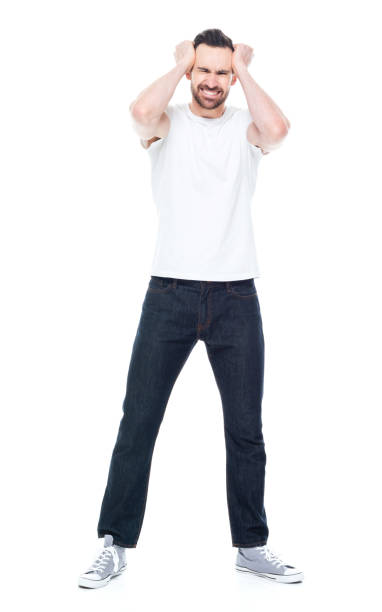 istock Handsome man in white shirt and jeans 1146492981