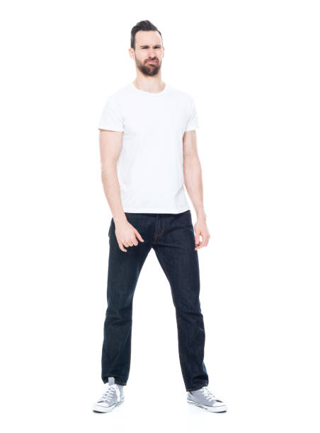 istock Handsome man in white shirt and jeans 1146493245