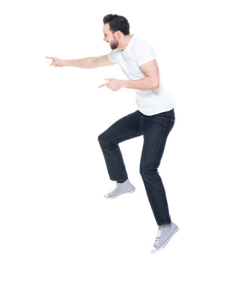 istock Handsome man in white shirt and jeans 1146493412