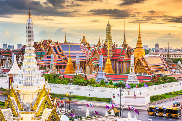 Bangkok, Thailand at the Temple of the Emerald Buddha and Grand Palace Bangkok, Thailand at the Temple of the Emerald Buddha and Grand Palace at dusk. pagoda photos stock pictures, royalty-free photos & images