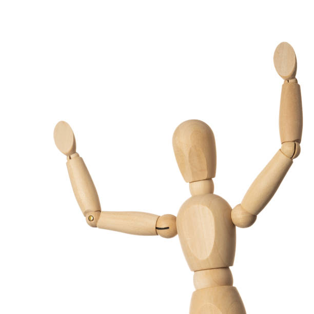 istock Wooden Mannequin with Arms Up Isolated on White Background 1146496236
