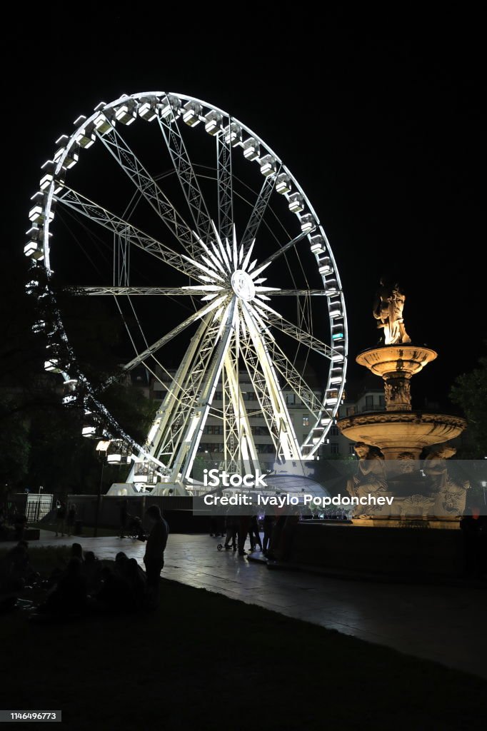 Ferris wheel and Danubius Fountain on Erzsébet Square, Budapest, Hungary, Europe Erzsébet Square (Erzsébet tér) is the largest green area in Budapest's inner city. The square was named after Elisabeth, 'Sisi', wife of Habsburg Emperor Franz Joseph, in 1858. 1858 Stock Photo