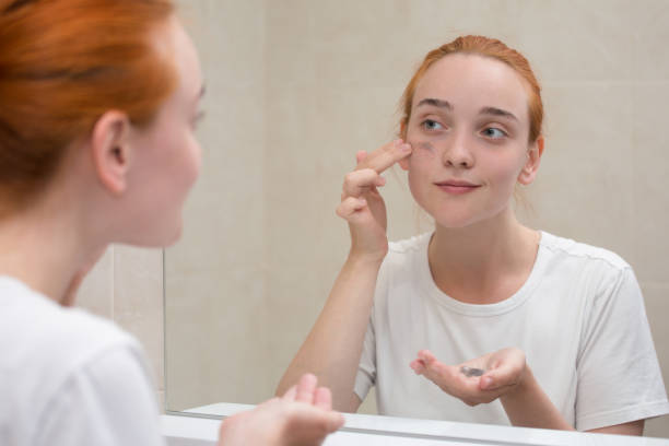 istock a young woman is  washing 1146497935