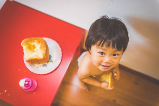 istock A asian girl eat bread 1146499430
