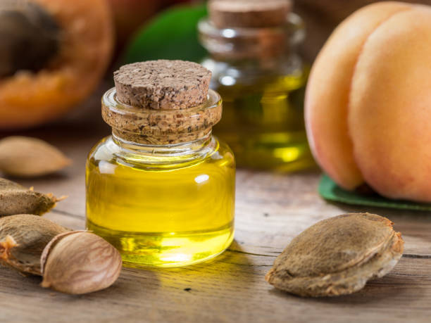 istock Apricot kernel oil and apricot kernels. 1146503268