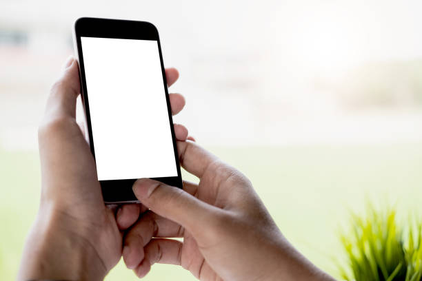 istock woman using Smartphone. Blank screen mobile phone for graphic display montage.networking service. 1146503680