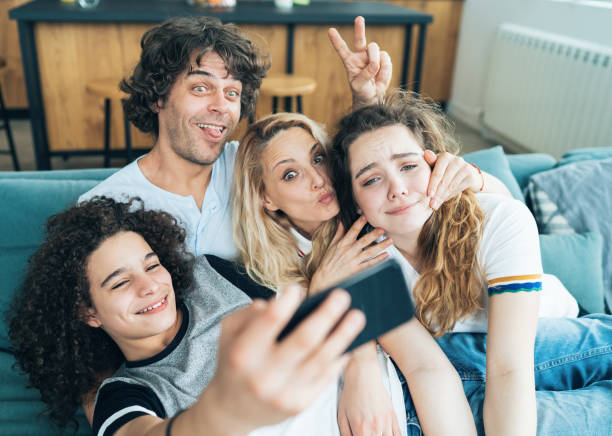 istock Happy family taking a selfie 1146504840
