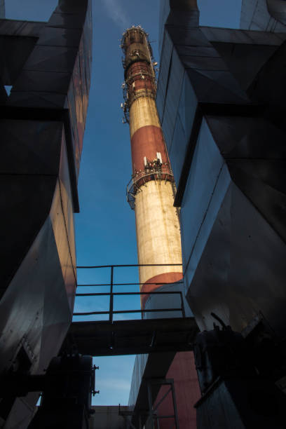 istock industrial white, red, high concrete chimney 1146506192