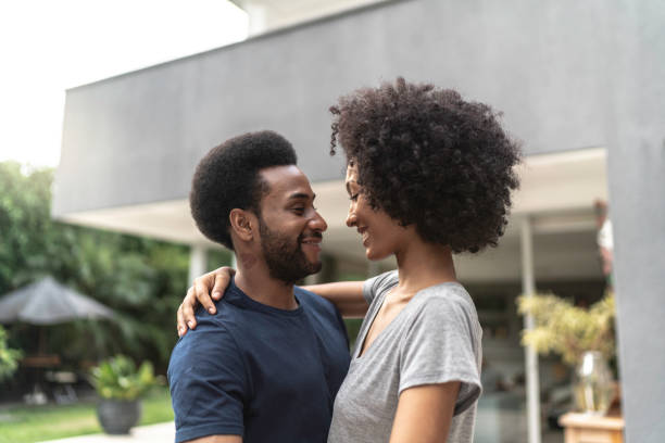 istock Lovely african couple dancing at home 1146506626