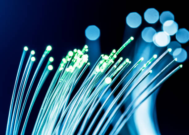 istock Bundle of optical fibers with lights in the ends. 1146509002