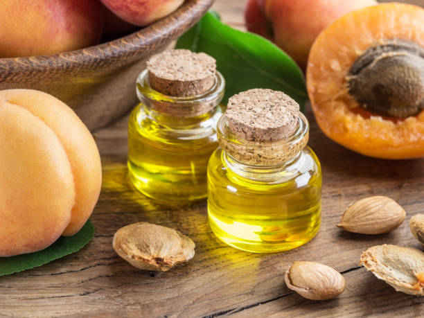 istock Apricot kernel oil and apricot kernels. 1146509676