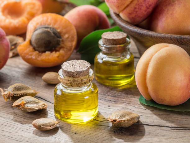 istock Apricot kernel oil and apricot kernels. 1146509705