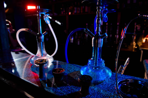 istock Group of eastern hookahs on table of a bar. 1146511948