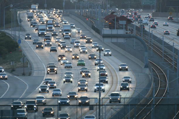 istock Cars on Freeway in Afternoon Light oncoming Traffic 1146512351