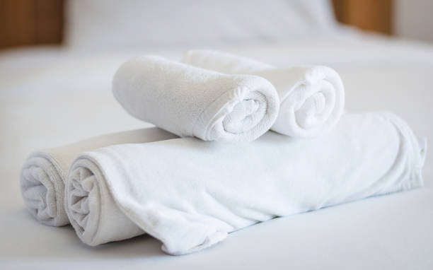 istock stack of towels on bed decoration in bedroom 1146512680