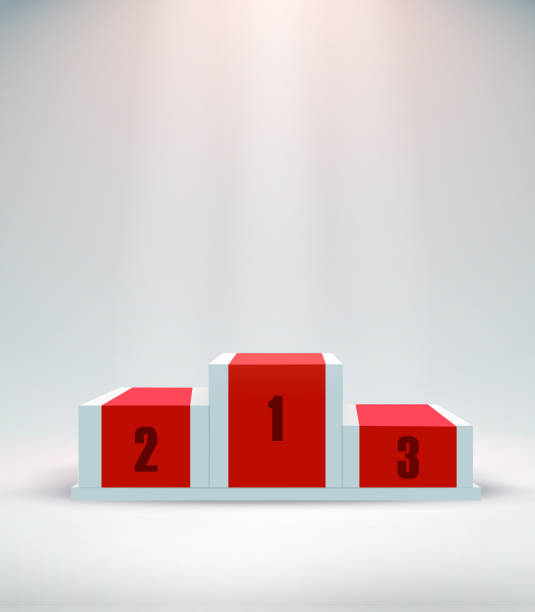 istock White winners podium with red carpet . Stage for awards ceremony. Pedestal. Spotlight. Vector illustration. 1146514028