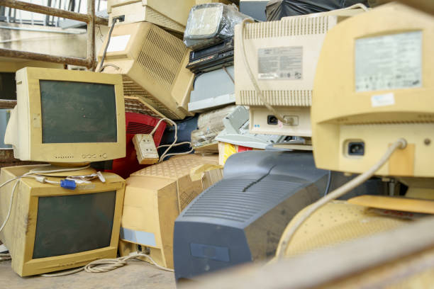 istock electronic waste stack together Monitor, Printer, desktop computer, fax for waiting to be recycled. Produced from plastic, copper, glass can be reused. 1146516375