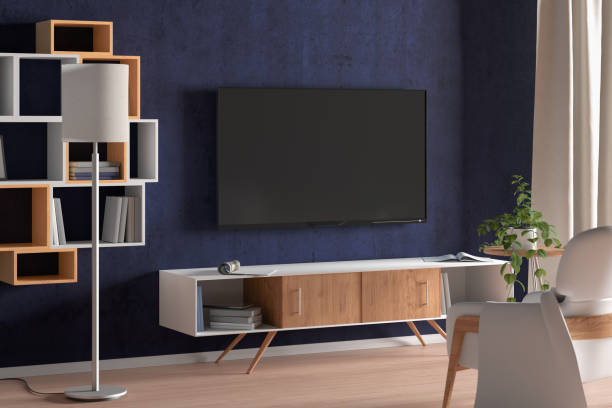 istock TV screen on the blue wall in modern living room 1146518312