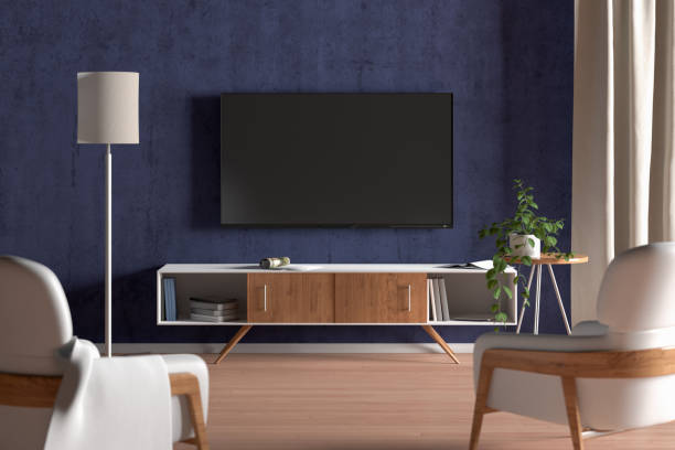 istock TV screen on the blue wall in modern living room 1146518329