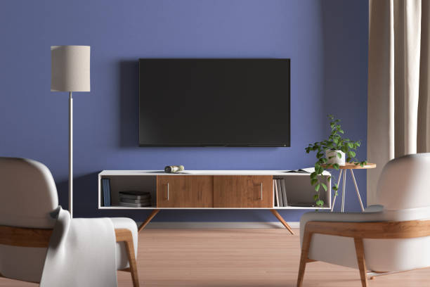 istock TV screen on the blue wall in modern living room 1146518340