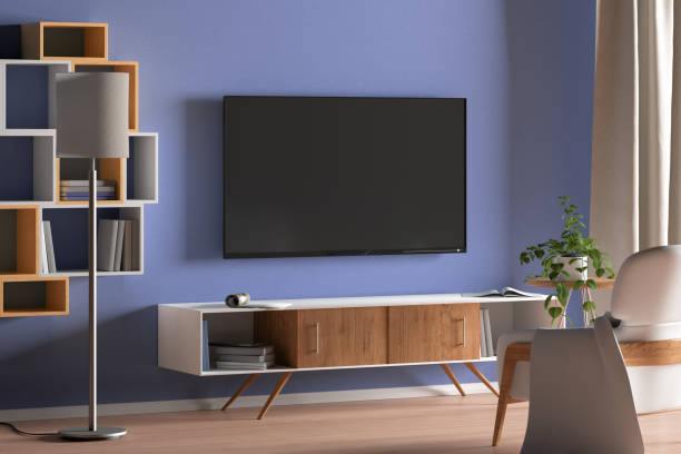 istock TV screen on the blue wall in modern living room 1146518366