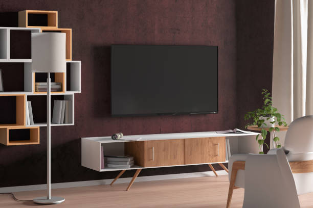 istock TV screen on the red wall in modern living room. 1146518414
