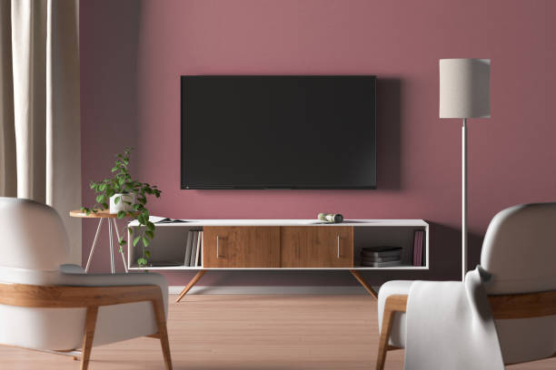 istock TV screen on the red wall in modern living room. 1146518421