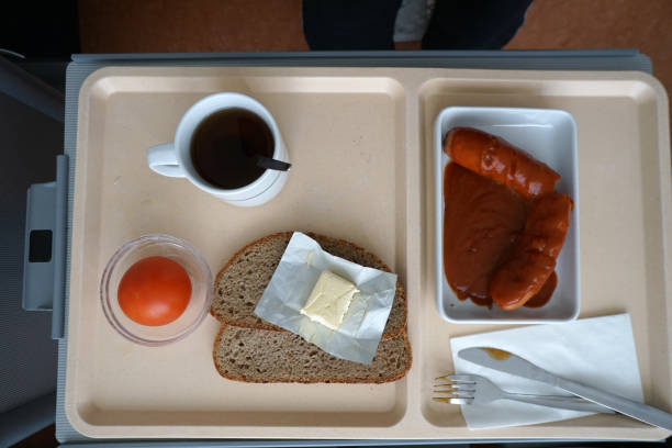 istock Curry sausage with bread for dinner in a canteen 1146518444