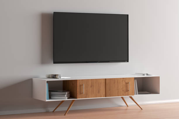 istock TV screen on the white wall in modern living room. 1146518457